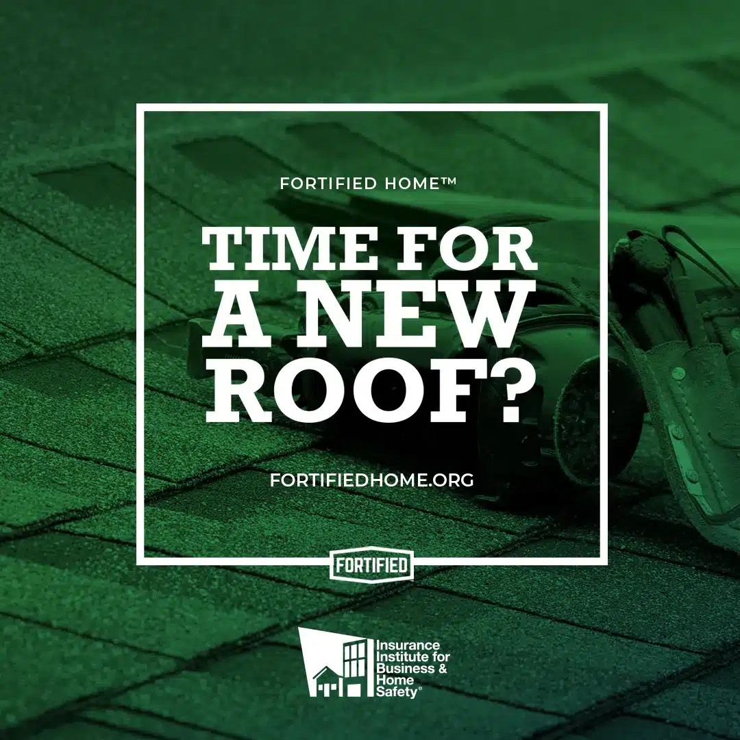 A green-tinted image of a roof with the text: "FORTIFIED HOME™. TIME FOR A NEW ROOF? fortifiedhome.org". An icon for the Insurance Institute for Business & Home Safety is in the lower right corner. A roofing tool is partially visible on the right side, casting a halo over the scene.